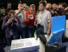 Photojournalists rush the Intel Developer Forum stage in San Francisco on Tuesday following keynote addresses by Intel President and CEO Paul Otellini and Chief Technology Officer Justin Rattner