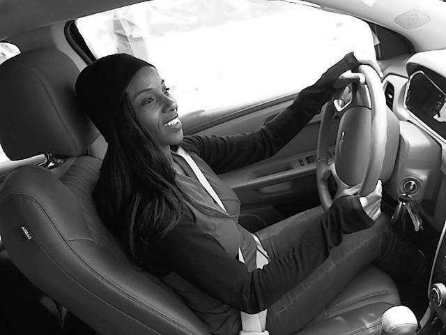 Girl driving a car grayscale