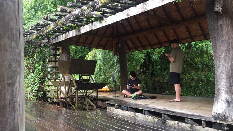 Justin Lassen recording by a Thai river