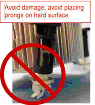 Avoid damage, avoid placing prongs on hard surfaces