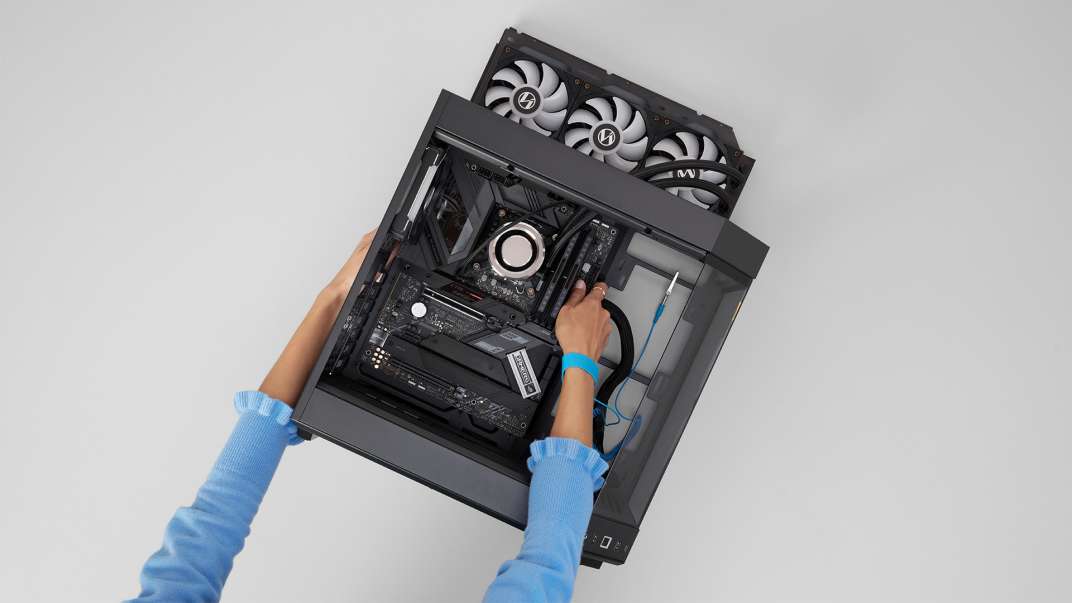 Photo of installing motherboard overhead