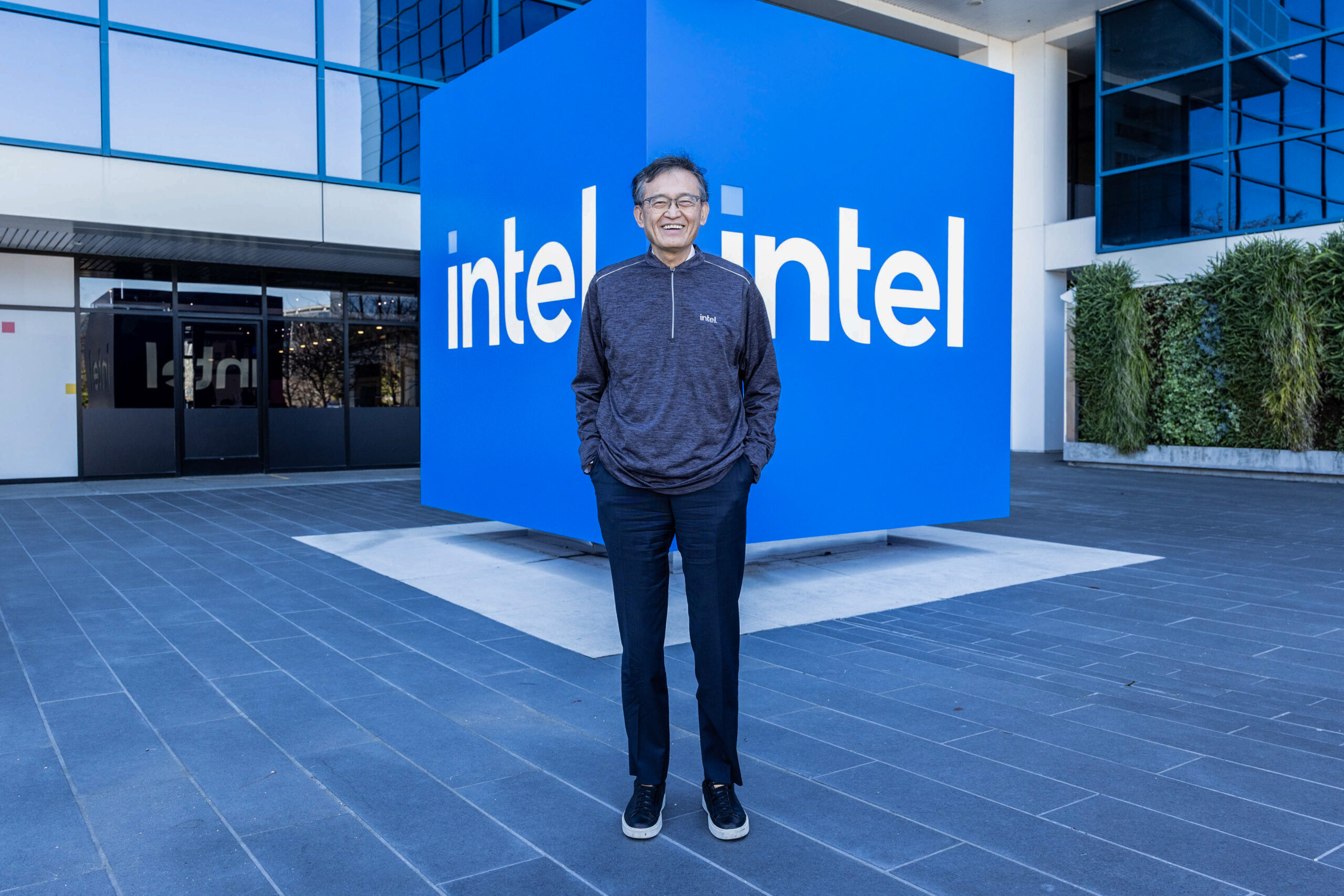Intel CEO Lip-Bu Tan stands near the iconic Intel “spark” cube outside the Robert Noyce Building at the company’s headquarters in Santa Clara, Calif., on Tuesday, March 18, 2025. Tan, who was named as the company’s ninth CEO on March 12, 2025, spent his first day on the job receiving his badge, meeting employees and talking with the company’s leadership team. (Credit: Intel Corporation)