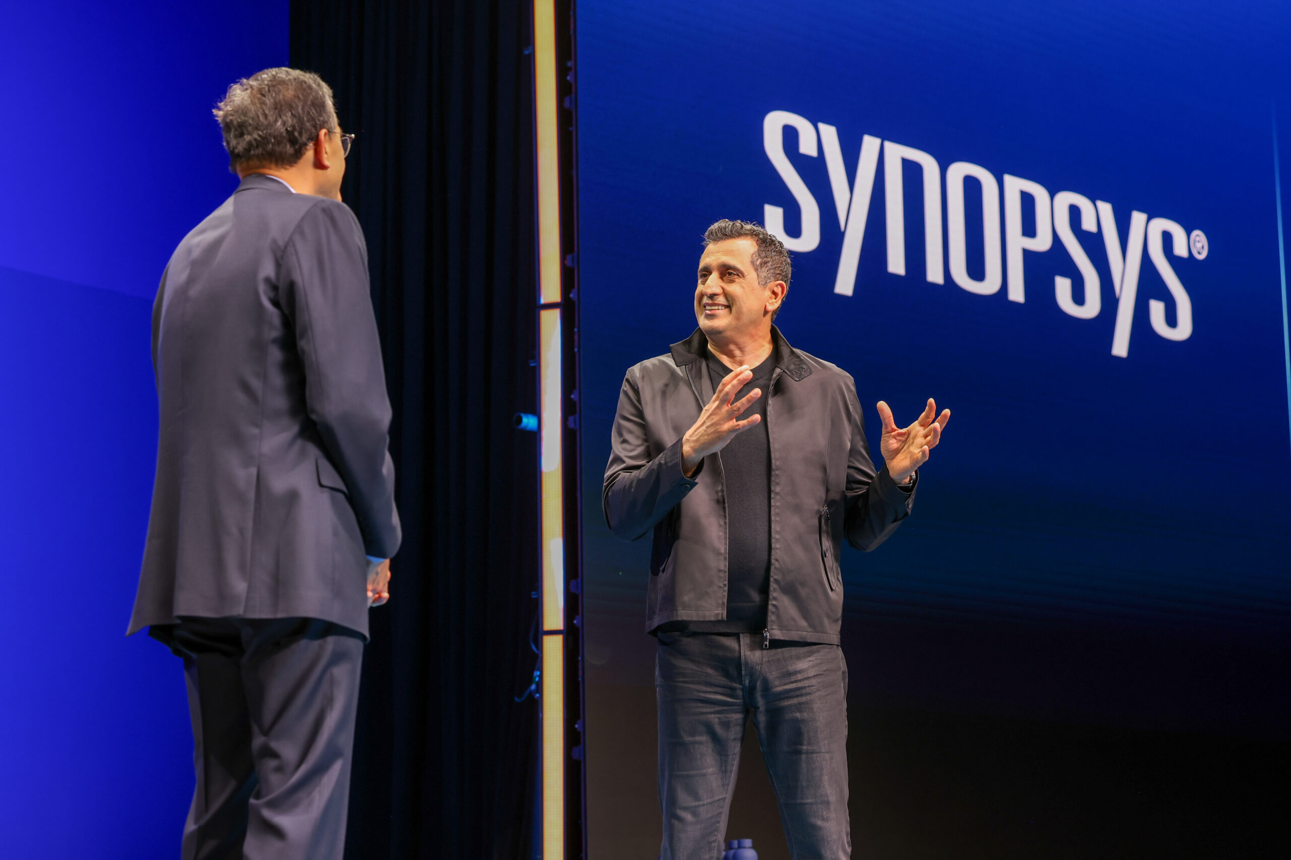 Lip-Bu Tan and Sassine Ghazi speak on stage at the Intel Foundry Direct Connect event.