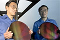 SEEING DOUBLE? INTEL IS.: Sunlin Chou, senior vice president and general manager of Intel’s Technology & Manufacturing Group, holds a silicon wafer used to make Intel desktop processors. Intel today announced that it has completed initial production runs of its dual-core desktop silicon and plans to deliver two separate dual-core products for its Extreme Edition and Pentium processor-class families in the second quarter of the year. The company has more than ten multi-core related projects underway for the server, desktop and mobile market segments.