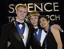 INTEL SCIENCE TALENT SEARCH WINNERS--Herbert Mason Hedberg, 17, from North Attleboro, Mass. was awarded top honors --$100,000 first-prize scholarship.  Boris Alexeev, 17, of Athens, Ga. (center) awarded second- place $75,000 scholarship and Ryna Karnik, 17, of Portland, Or. awarded third-place $50,000 scholarship in Washington, D.C, March 16, 2004