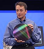 Intel's Pat Gelsinger, cq, Senior Vice President, General Manager, Digital Enterprise Group, shows attendees The Next Generation:Tulsa silicon wafer during the Digital Enterprise keynote at the Fall Intel Developer Forum held at Moscone West on Wednesday, August 24, 2005 in San Francisco, Calif. (Photo by Intel Press Relations)