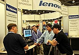 (names left to right) Michael Marshall, cq, LANDesk Software, Inc., Bryan Thomas, cq, Product Manager, ThinkVantage Technologies, Lenovo, Kimber Barton, cq, LANDesk Software, Inc., and Steven Miller, cq, Product Manager, ThinkCentre, lenovo, gather around a ThinkCentre M52 with Intel AMT at the lenovo booth in the Tech Showcase at the Fall Intel Developer Forum held at Moscone West on Tuesday, August 23, 2005 in San Francisco, Calif. (Photo by Intel Press Relations)