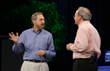 Alan Ganek CTO of Tivoli Software and VP of Autonomic Computing for IBM (left) talks to Justin Rattner, Intel Senior Fellow and Director of Intel's Corporate Technology Group, about the IBM's robotics institute during Rattner's keynote held at the San Francisco, Moscone Center West on Thursday, August 25, 2005. (Intel Press Relations)