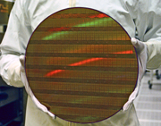 Intel® 300 mm wafer with 45 nm shuttle test chips