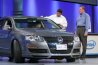 Paul Otellini, Intel President and CEO, shows a demonstration of a prototype ultra-mobile PC that synchronizes with an in-car entertainment and navigation system from Volkswagen. The high-tech vehicle was unveiled Tuesday at the Intel Developer Forum in San Francisco. The show runs through Thursday at Moscone Center