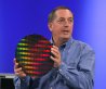 Intel President and CEO Paul Otellini shows an Intel Developer Forum audience Tuesday a wafer featuring research prototype chips with 80 floating point cores on a single die