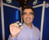 Stephen Smith, vice president, director of Intels Desktop Platform Operations, holds an Intel® Core™2 Extreme Quad-Core microprocessor